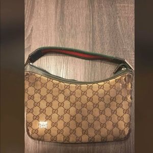 Brown monogrammed Gucci bag